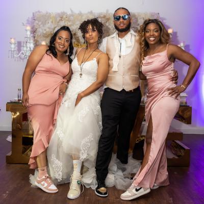 Latangula and Cardell pose with family members during their New Orleans wedding celebration.